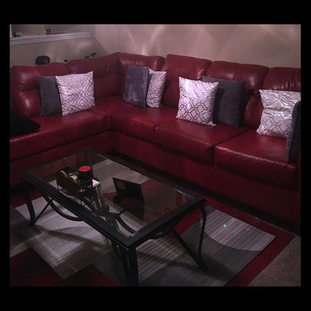 Sectional couch 2 end tables and a area rug